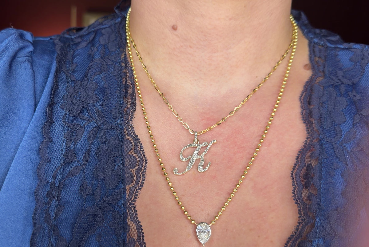 Omega Diamond Letter Pendant